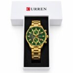 Montre CURREN avec bracelet doré et cadran vert dans sa boîte, vue carrée